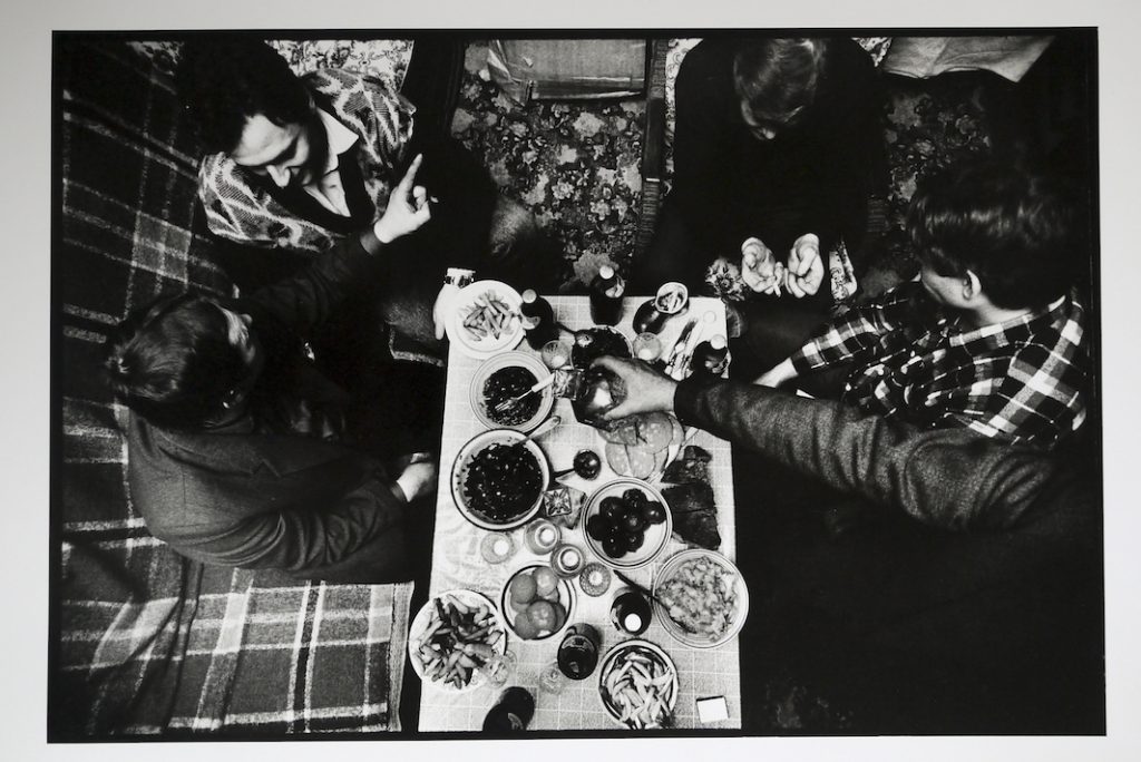 Miners drinking and dinning after a shift at the 'Socialist Dombas' coal mine around at Victor and Katya's old flat.