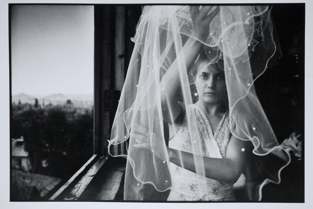 Irina Slakar preparing her veil on her wedding day.  She is marrying Demitri, a former miner at the Socialist Donbass coal mine. Donetsk, Ukraine.