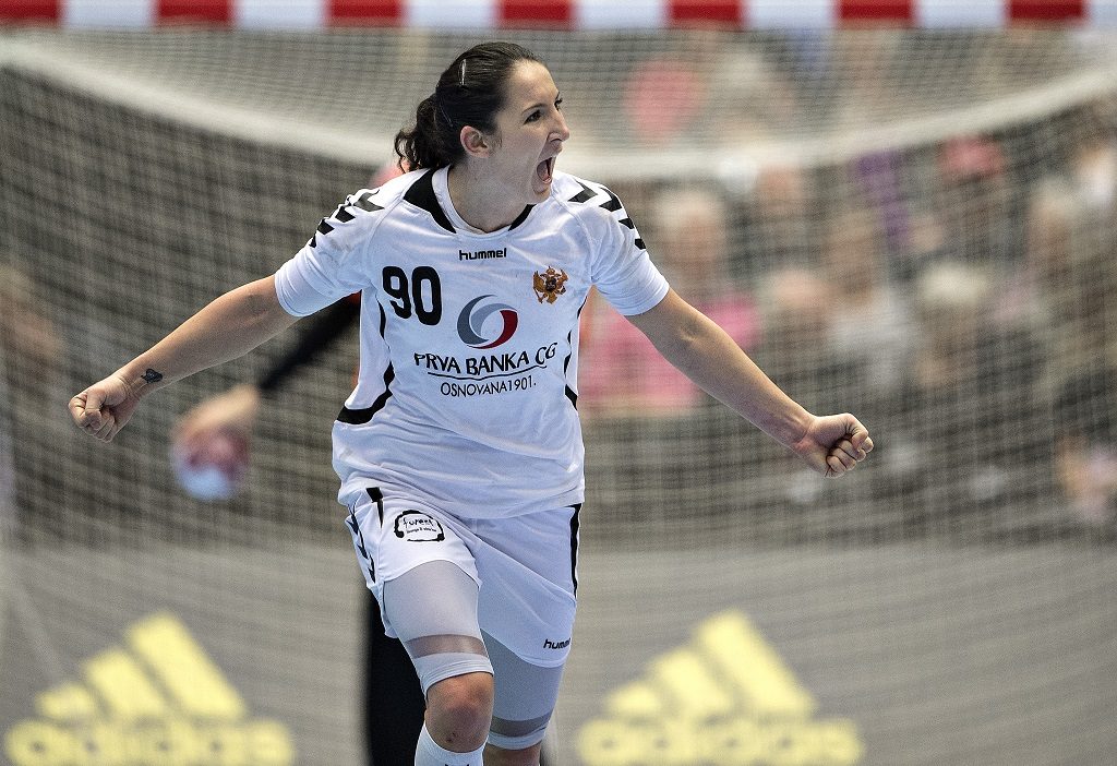 RESTRICTED TO EDITORIAL USE 
Montenegro's Milena Raicevic reacts after scoring during the World Women's Handball Championship group A match between Montenegro and Hungary in Herning, Denmark, on December 8, 2015. AFP PHOTO / SCANPIX DENMARK / Henning Bagger ++DENMARK OUT / AFP PHOTO / SCANPIX DENMARK / HENNING BAGGER