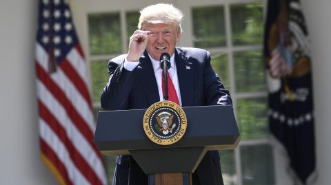 US President Donald Trump announces his decision to withdraw the US from the Paris Climate Accords in the Rose Garden of the White House in Washington, DC, on June 1, 2017.     
"As of today, the United States will cease all implementation of the non-binding Paris accord and the draconian financial and economic burdens the agreement imposes on our country," Trump said. / AFP PHOTO / SAUL LOEB