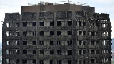 LONDON, ENGLAND - JUNE 15:  A general view of the fire damaged exterior of Grenfell Tower on June 15, 2017 in London, England. At least 17 people have been confirmed dead and dozens missing, after the 24 storey residential Grenfell Tower block in Latimer Road was engulfed in flames in the early hours of June 14. The number of fatalities are expected to rise.  (Photo by Dan Kitwood/Getty Images)