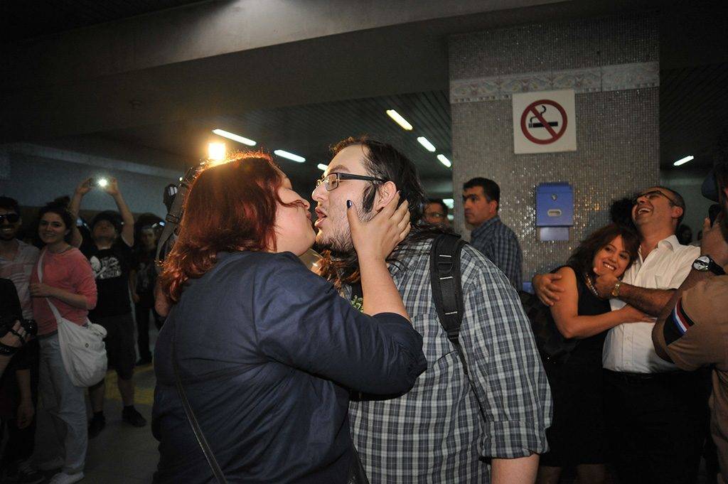 Turkish demonstrators kiss on May 25, 2013 to protest against moral warnings at subway stations in Ankara. Dozens of couples have locked lips at a subway stop in to protest subway authorities' admonishment of a couple that kissed in public. Last week, Ankara subway officials made a announcement, asking passengers "to act in accordance with moral rules" after spotting via security cameras a couple kissing.     AFP PHOTO/STR / AFP PHOTO / -