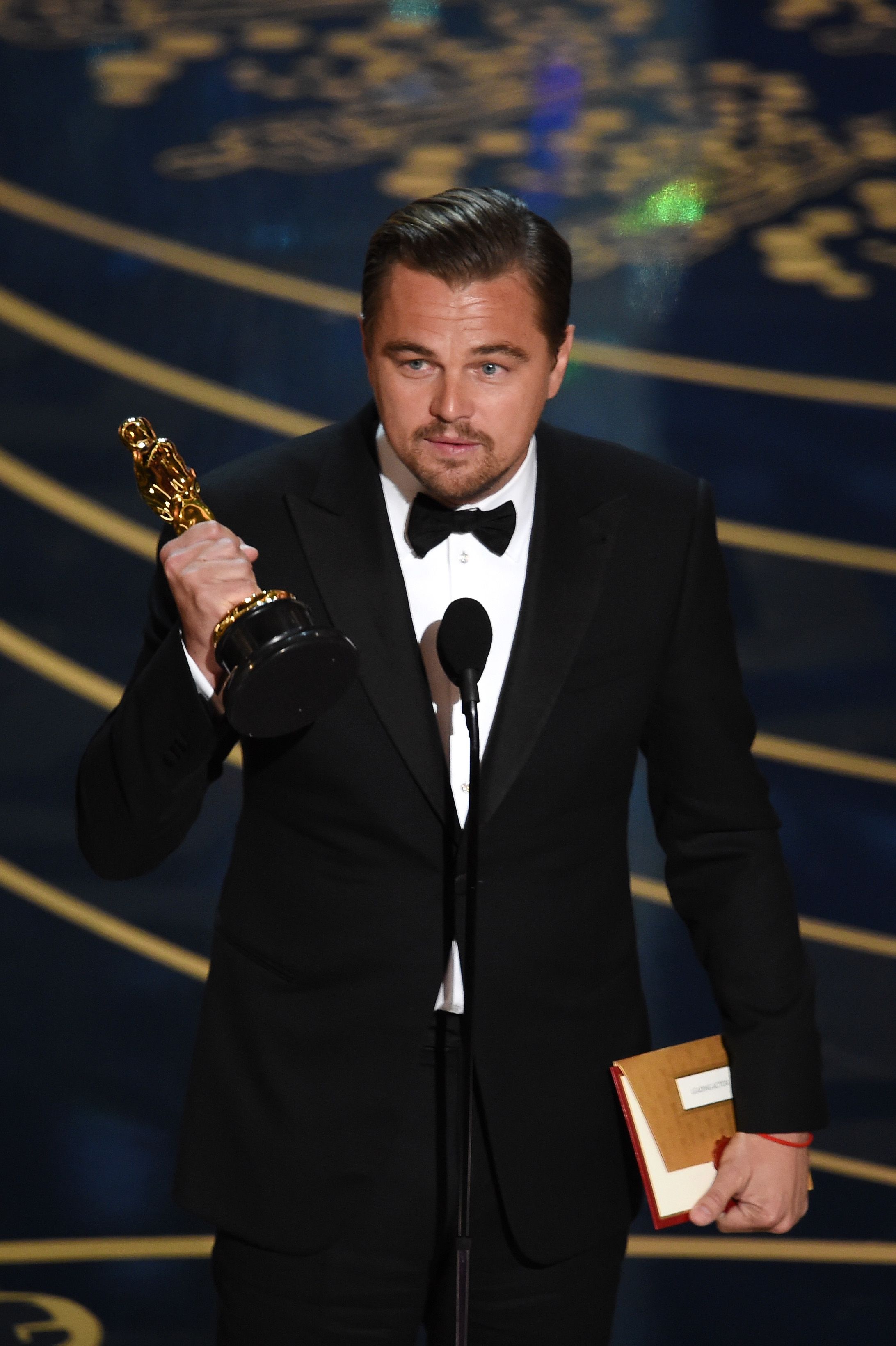 HOLLYWOOD, CA - FEBRUARY 28:  Actor Leonardo DiCaprio accepts the Best Actor award for 'The Revenant' onstage during the 88th Annual Academy Awards at the Dolby Theatre on February 28, 2016 in Hollywood, California.  (Photo by Kevin Winter/Getty Images)