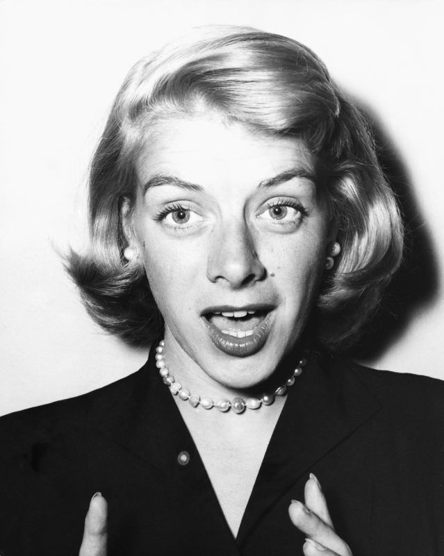 (Original Caption) Press Reception For Rosemary Clooney, 1955. The famous American singing star, Rosemary Clooney, who begins a two week season at the London Palladium next Monday - seen singing a song at this afternoon's press reception at The Prince Of Wales Theatre. (Photo by © Hulton-Deutsch Collection/CORBIS/Corbis via Getty Images)