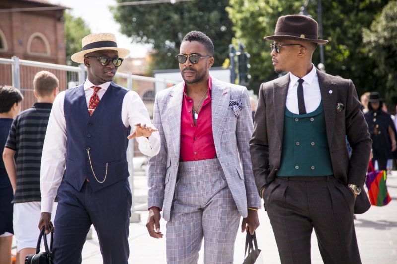 FLORENCE, ITALY - JUNE 14:   Gentlemen, wearing suits,  are seen during the 94th Pitti Immagine Uomo at Fortezza Da Basso on June 14, 2018 in Florence, Italy. (Photo by Claudio Lavenia/Getty Images)
