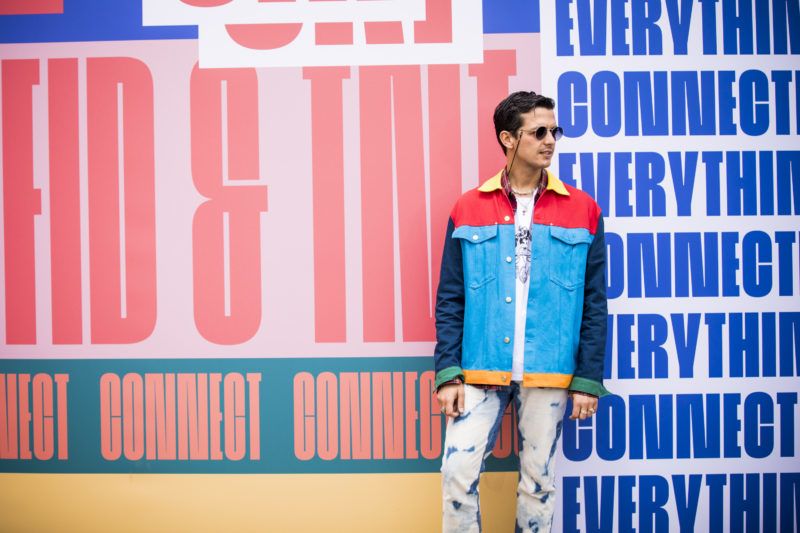 FLORENCE, ITALY - JUNE 14:   Alessandro Enriquez, wearing Alessandro Enriquez's colorfull denim jacket, is seen during the 94th Pitti Immagine Uomo at Fortezza Da Basso on June 14, 2018 in Florence, Italy. (Photo by Claudio Lavenia/Getty Images)