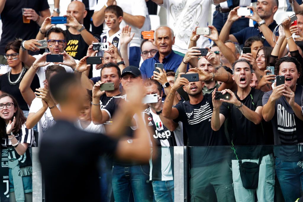 TURIN, ITALY - AUGUST 25: supporters of Juventus take pictures of Cristiano Ronaldo of Juventus  during the Italian Serie A   match between Juventus v Lazio at the Allianz Stadium on August 25, 2018 in Turin Italy (Photo by Laurens Lindhout/Soccrates/Getty Images)