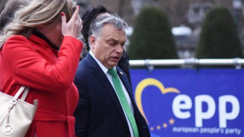 Hungary's Prime minister Viktor Orban (R) arrives to attend a meeting of the European People's Party (PPE) in Brussels on December 14, 2017, ahead of a summit of European Union (EU) leaders. - European leaders will discuss the migration crisis and defence on December 14, followed by Brexit the day after. (Photo by Riccardo PAREGGIANI / AFP)