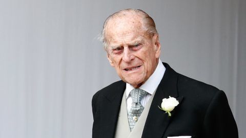 Britain's Prince Philip, Duke of Edinburgh waits for the carriage carrying Princess Eugenie of York and her husband Jack Brooksbank to pass at the start of the procession after their wedding ceremony at St George's Chapel, Windsor Castle, in Windsor, on October 12, 2018. (Photo by Alastair Grant / POOL / AFP)