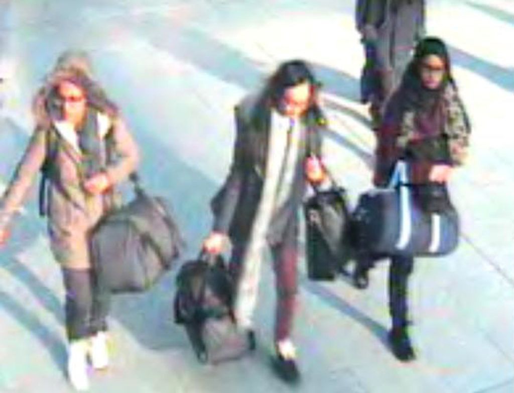 A handout CCTV picture received from the Metropolitan Police Service (MPS) on February 23, 2015 shows (L-R) British teenagers Amira Abase, Kadiza Sultana and Shamima Begum walking with luggage at Gatwick Airport, south of London, on February 17, 2015. Britain debated on February 22 how to stop teenage girls joining the Islamic State group in Syria after three high-achieving youngsters became the latest to run away from home. School friends Kadiza Sultana, 17, and 15-year-olds Shamima Begum and Amira Abase left their east London homes on February 17, 2015 and flew to Istanbul, raising concerns they would travel on to Syria to join IS jihadists.  RESTRICTED TO EDITORIAL USE - MANDATORY CREDIT " AFP PHOTO / METROPOLITAN POLICE " - NO MARKETING NO ADVERTISING CAMPAIGNS - DISTRIBUTED AS A SERVICE TO CLIENTS (Photo by - / METROPOLITAN POLICE / AFP)