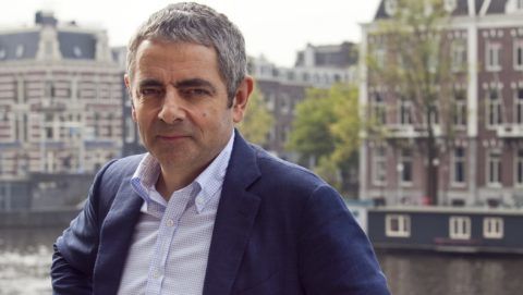 AMSTERDAM, NETHERLANDS - OCTOBER 03:  Rowan Atkinson poses during a photocall to promote Johnny English Reborn at Amstel Hotel on October 3, 2011 in Amsterdam, Netherlands. (Photo by Helene Wiesenhaan/WireImage)
