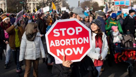 (FILES) In this file photo taken on January 18, 2019, anti-abortion activists participate in the "March for Life," an annual event to mark the anniversary of the 1973 Supreme Court case Roe v. Wade, which legalized abortion in the US, outside the US Supreme Court in Washington, DC. - The Alabama senate passed the most restrictive abortion bill in the United States on May 14, 2019, banning any termination of pregnancy and punishing doctors who perform the procedure with life in prison. (Photo by SAUL LOEB / AFP)