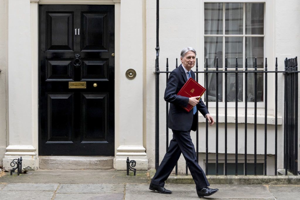 (FILES) In this file photo taken on March 13, 2019 Britain's Chancellor of the Exchequer Philip Hammond leaves from 11 Downing Street in central London. - British finance minister Philip Hammond said July 21, 2019 he would make a point of resigning before Boris Johnson became prime minister, saying he could never agree to his Brexit strategy. (Photo by Niklas HALLE'N / AFP)
