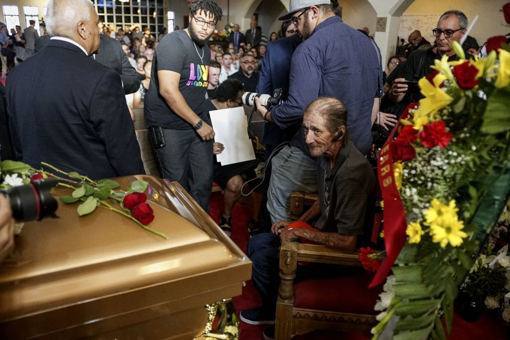 EL PASO, TX - AUGUST 16: Antonio Basco greets well wishers to a public memorial for his wife, Margie Reckard, on August 16, 2019 in El Paso, Texas. Reckard was one of 22 killed during the Walmart shooting in El Paso on August 3rd. Basco invited the public to attend the memorial in her honor and has laid fresh flowers everyday since the shooting at a make-shift memorial outside the outlet.   Sandy Huffaker/Getty Images/AFP